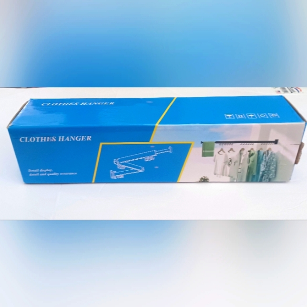 Wall mount retractable arm clothes hanger